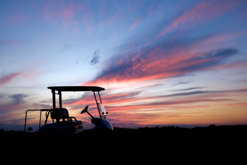 golf cart at sunset