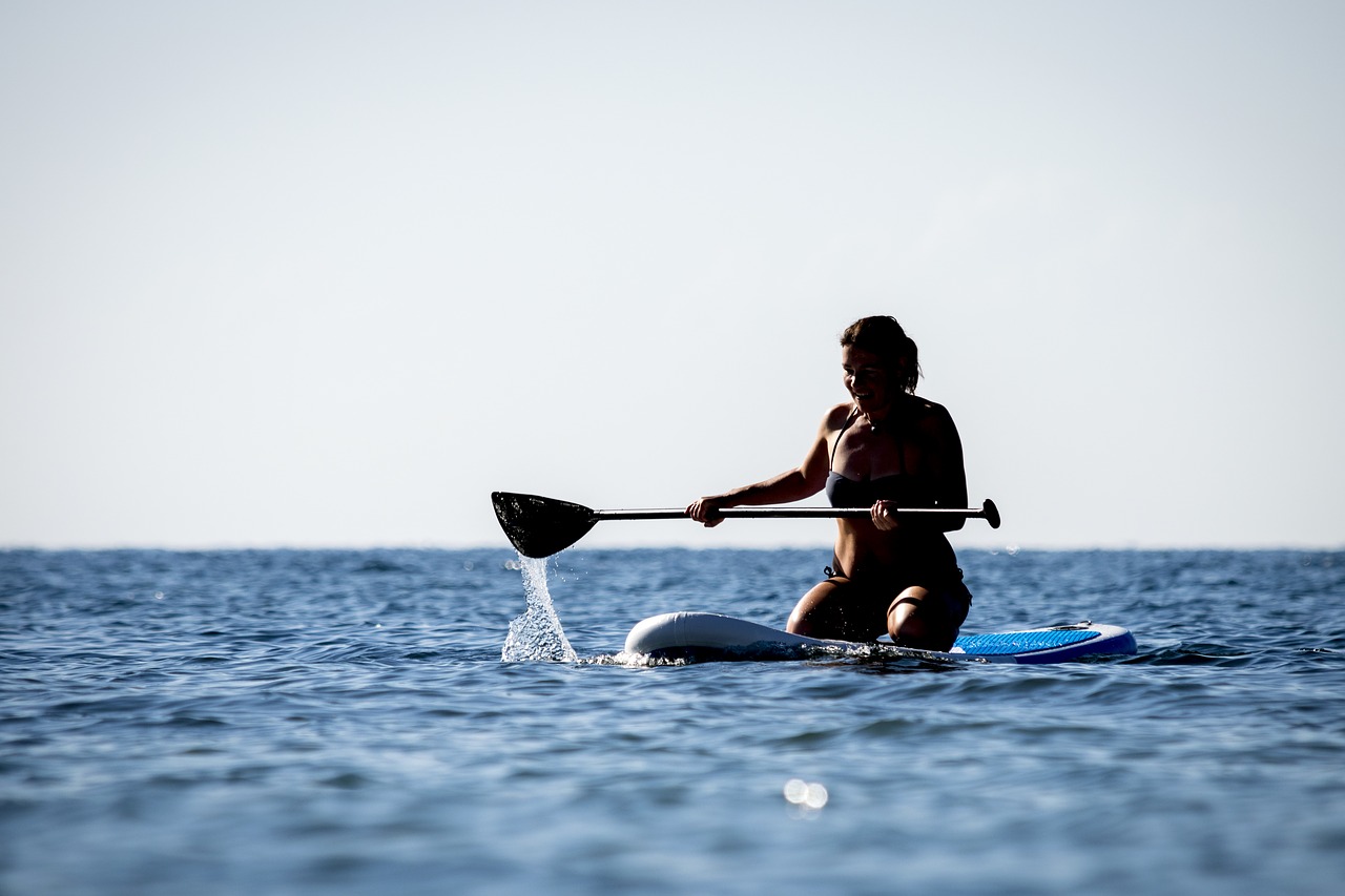 woman paddleboarding
